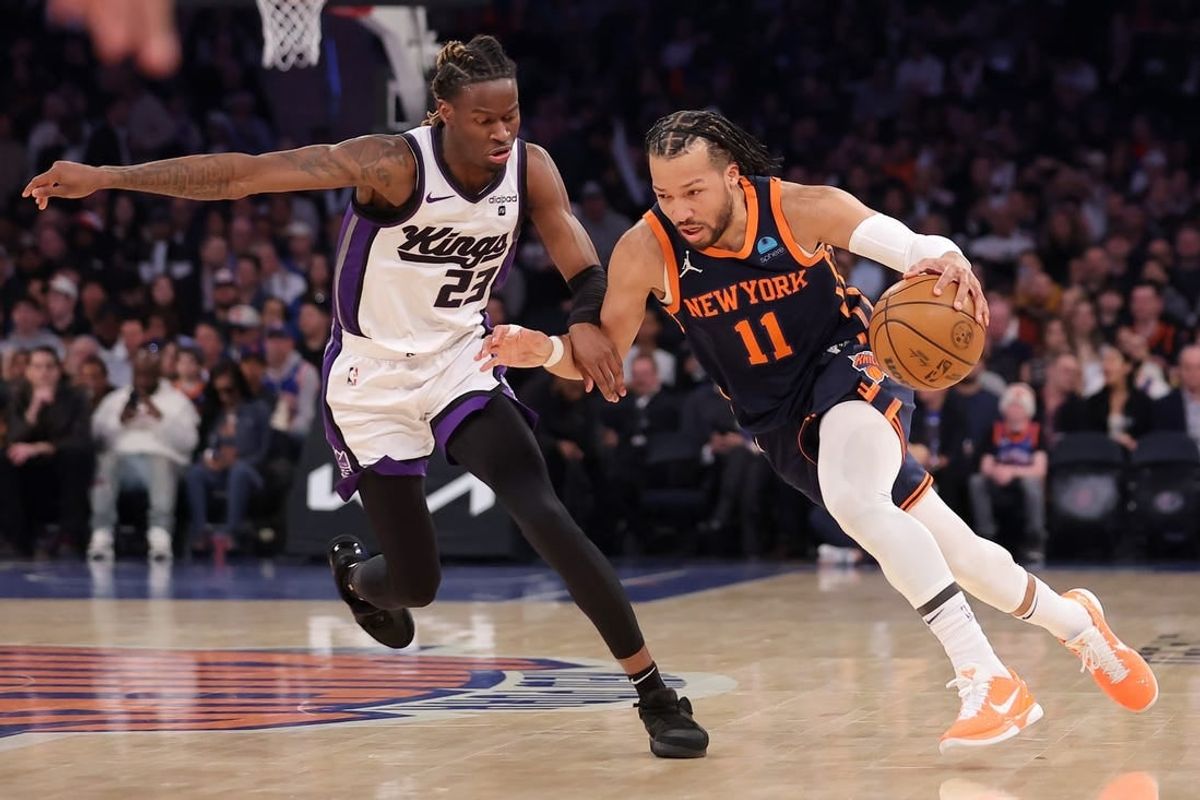 Apr 4, 2024; New York, New York, USA; New York Knicks guard Jalen Brunson (11) drives to the basket against Sacramento Kings guard Keon Ellis (23) during the first quarter at Madison Square Garden.