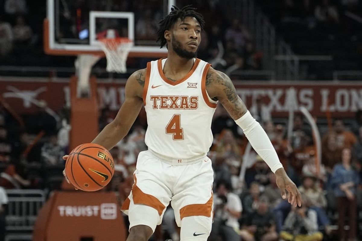 Dec 29, 2023; Austin, Texas, USA; Texas Longhorns guard Tyrese Hunter (4) dribbles during the first half against UNC Greensboro at Moody Center.