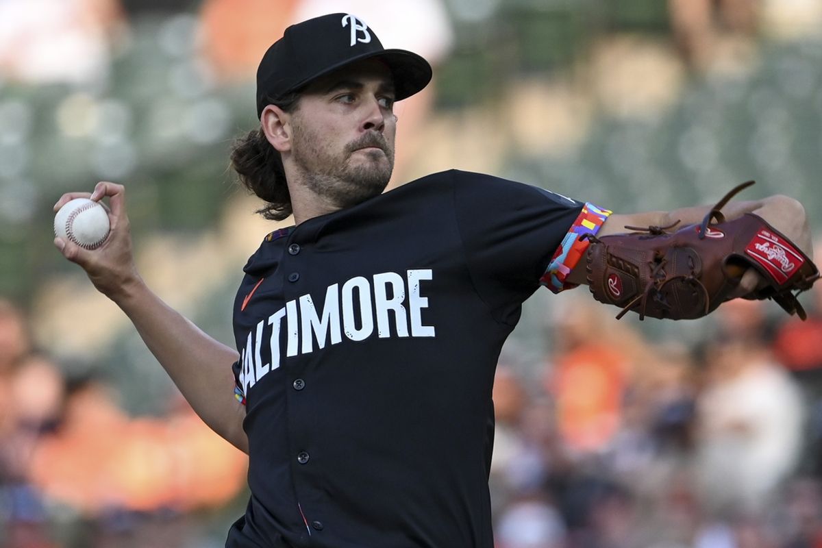 Aug 14, 2024; Baltimore, Maryland, USA; Baltimore Orioles starting pitcher Dean Kremer (64) throws a first inning pitch against the Washington Nationals  at Oriole Park at Camden Yards. Mandatory Credit: Tommy Gilligan-USA TODAY Sports