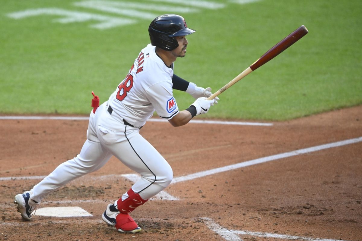 Aug 14, 2024; Cleveland, Ohio, USA; Cleveland Guardians left fielder Steven Kwan (38) singles in the fifth inning against the Chicago Cubs at Progressive Field. Mandatory Credit: David Richard-USA TODAY Sports