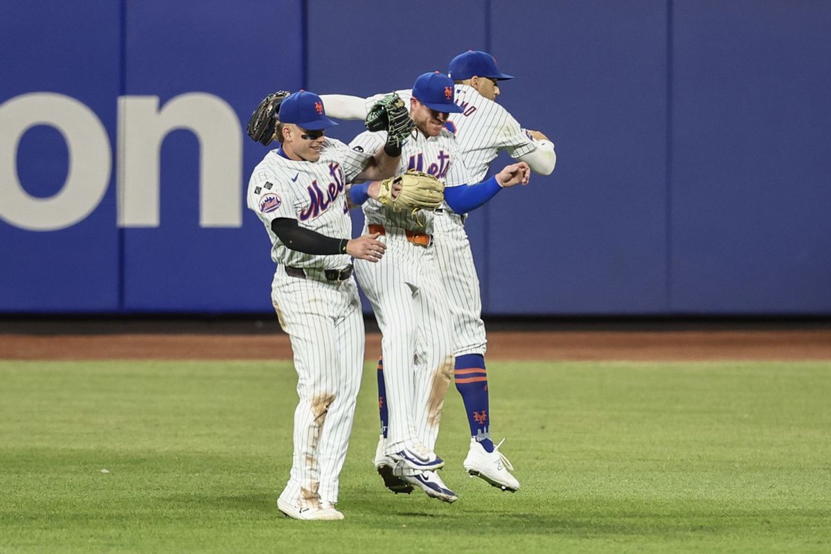 Aug 14, 2024; New York City, New York, USA;  New York Mets outfielders Harrison Bader (44), Ben Gamel (21) and Brandon Nimmo (9) celebrate after defeating the Oakland Athletics 9-1 at Citi Field. Mandatory Credit: Wendell Cruz-USA TODAY Sports