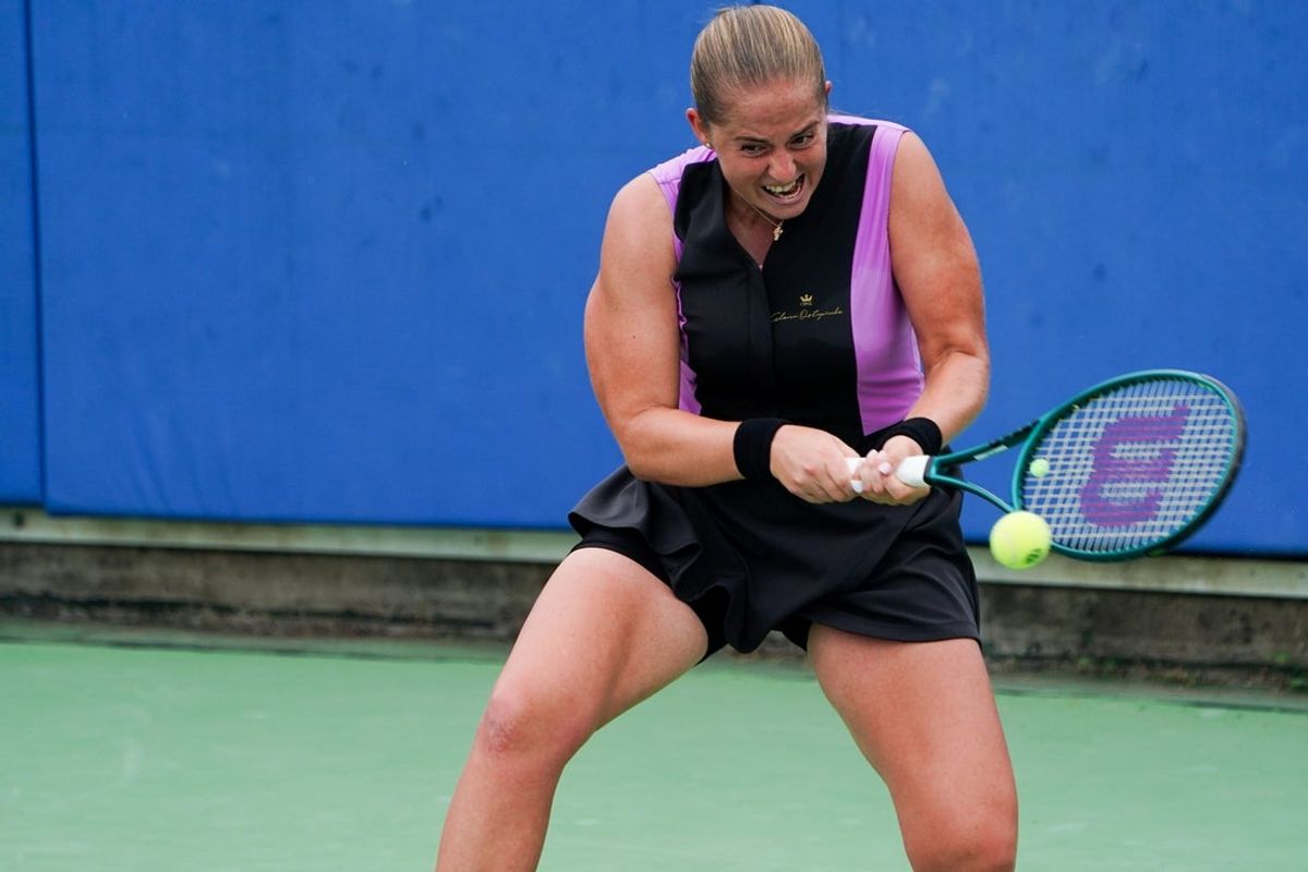 Jelena Ostapenko makes a hit to Elena Avanesyan in the women’s singles round 2 during the Cincinnati Open, Thursday, Aug. 15, 2024, at the Lindner Family Tennis Center in Mason. Avanesyan won 2-6, 6-2, 6-2.