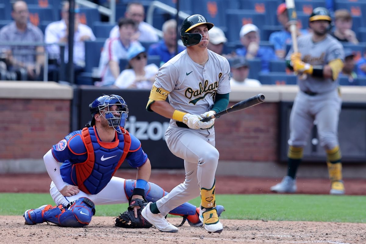 Aug 15, 2024; New York City, New York, USA; Oakland Athletics center fielder JJ Bleday (33) follows through on a grand slam home run against the New York Mets during the fourth inning at Citi Field. Mandatory Credit: Brad Penner-USA TODAY Sports