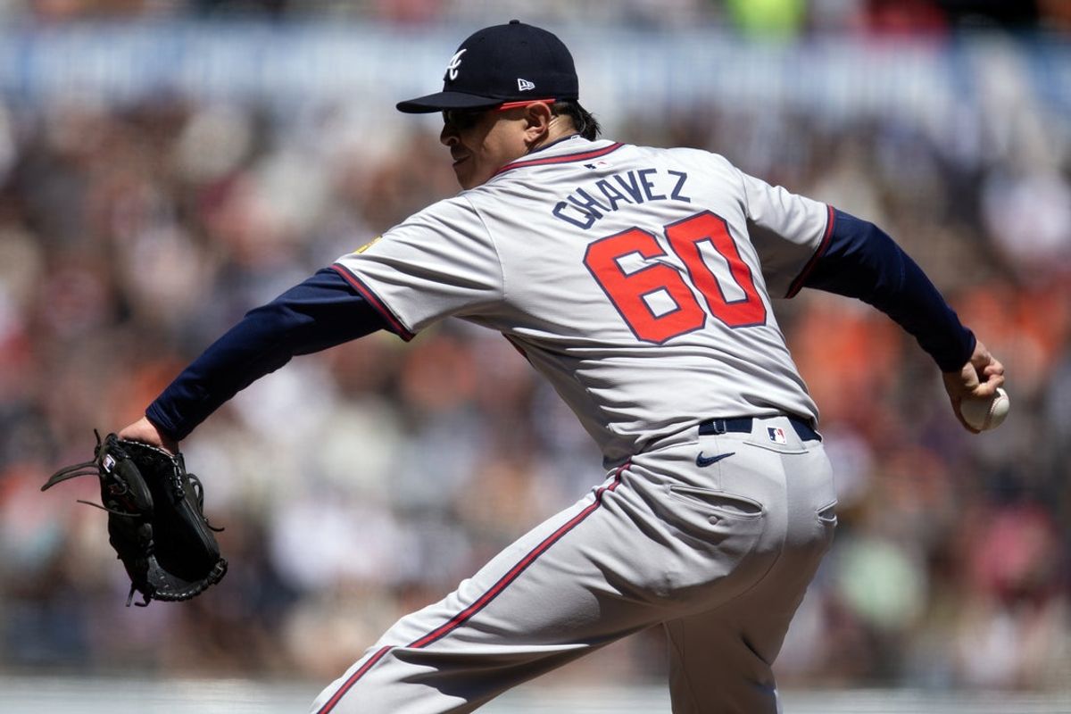 Aug 15, 2024; San Francisco, California, USA; Atlanta Braves pitcher Jesse Chavez (60) delivers against the San Francisco Giants during the sixth inning at Oracle Park. Mandatory Credit: D. Ross Cameron-Imagn Images