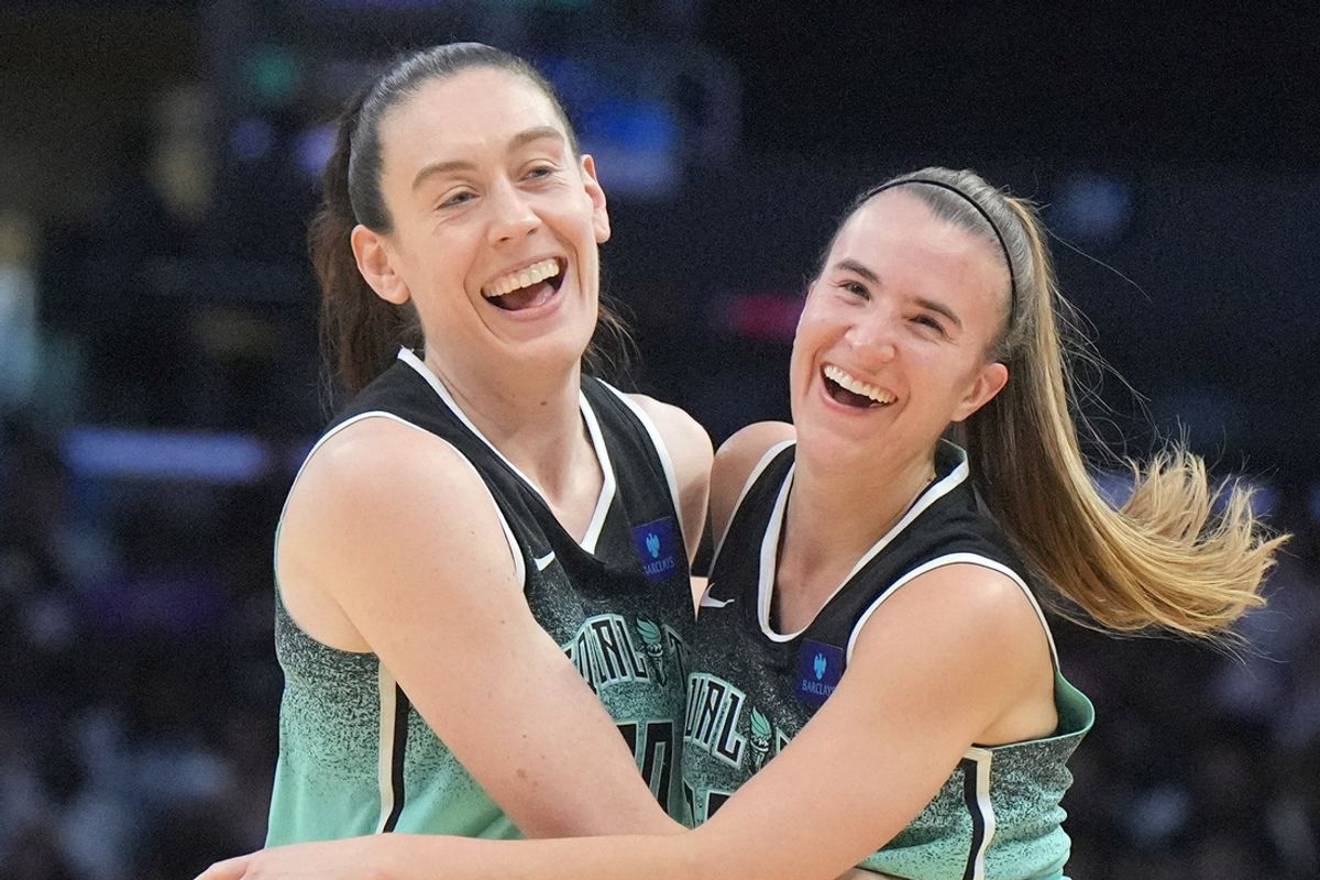 Aug 15, 2024; Los Angeles, California, USA; New York Liberty forward Breanna Stewart (30) and guard Sabrina Ionescu (20) celebrate in the first half against the LA Sparks Crypto.com Arena. Mandatory Credit: Kirby Lee-USA TODAY Sports