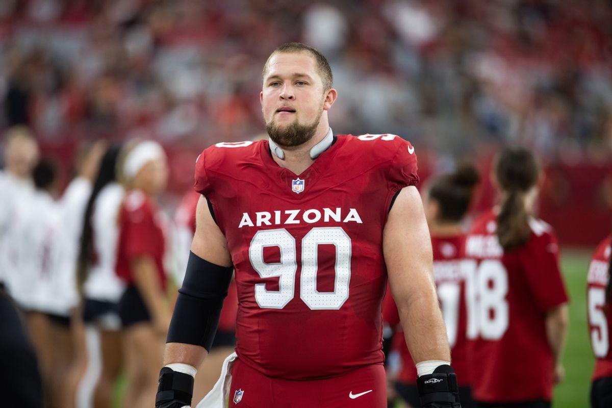 Aug 10, 2024; Glendale, Arizona, USA; Arizona Cardinals defensive end Ben Stille (90) against the New Orleans Saints during a preseason NFL game at State Farm Stadium. Mandatory Credit: Mark J. Rebilas-Imagn Images