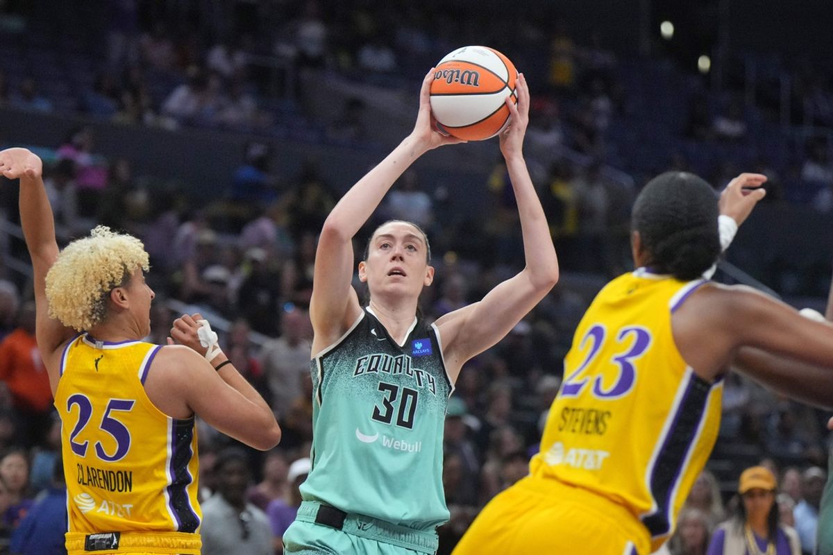 Aug 15, 2024; Los Angeles, California, USA; New York Liberty forward Breanna Stewart (30) shoots the ball against LA Sparks guard Layshia Clarendon (25) in the first half at Crypto.com Arena. Mandatory Credit: Kirby Lee-Imagn Images