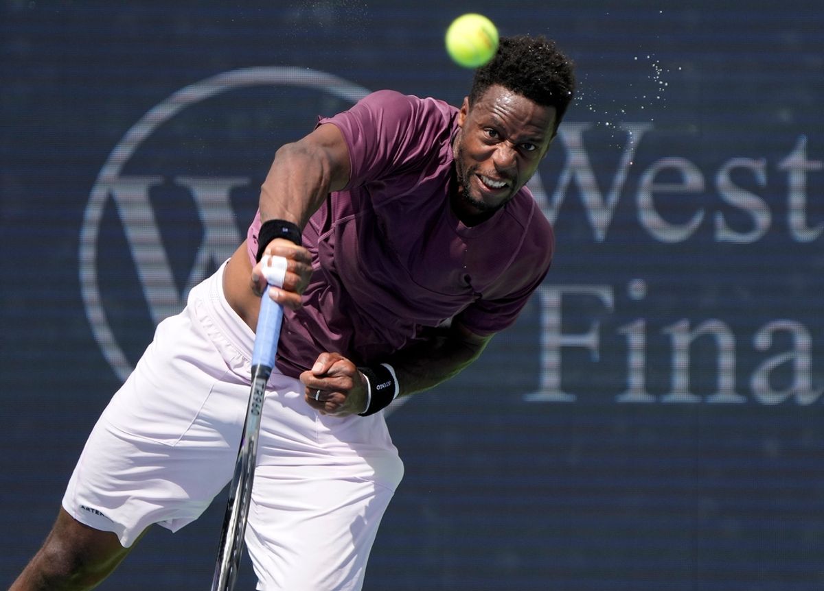 Gael Monfils of France makes a serve to Carlos Alcaraz of Spain during the men's singles round 2 during the Cincinnati Open at the Lindner Family Tennis Center in Mason on Friday, August 16, 2024. Monfils upset Alcaraz 4-6, 7-6, (5), 6-4.