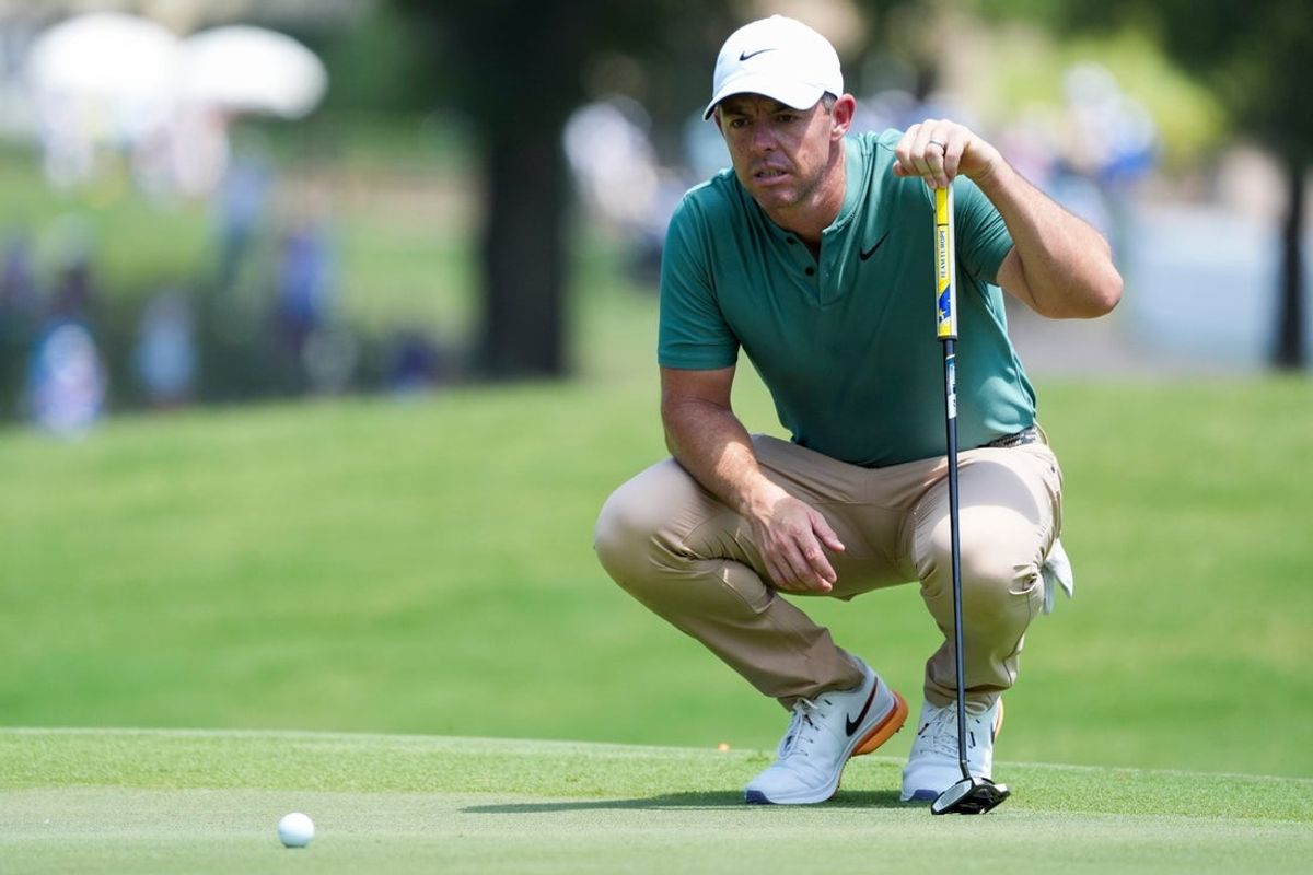 Rory McIlroy lines up a putt on the first hole during the second day of the FedEx St. Jude Championship at TPC Southwind in Memphis, Tenn., on Friday, August 16, 2024.