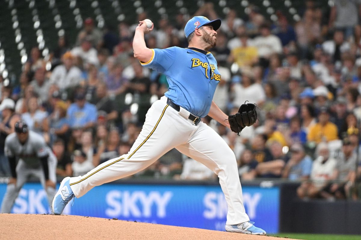 Aug 16, 2024; Milwaukee, Wisconsin, USA; Milwaukee Brewers pitcher Aaron Civale (32) delivers a pitch against the Cleveland Guardians in the first inning at American Family Field. Mandatory Credit: Michael McLoone-USA TODAY Sports