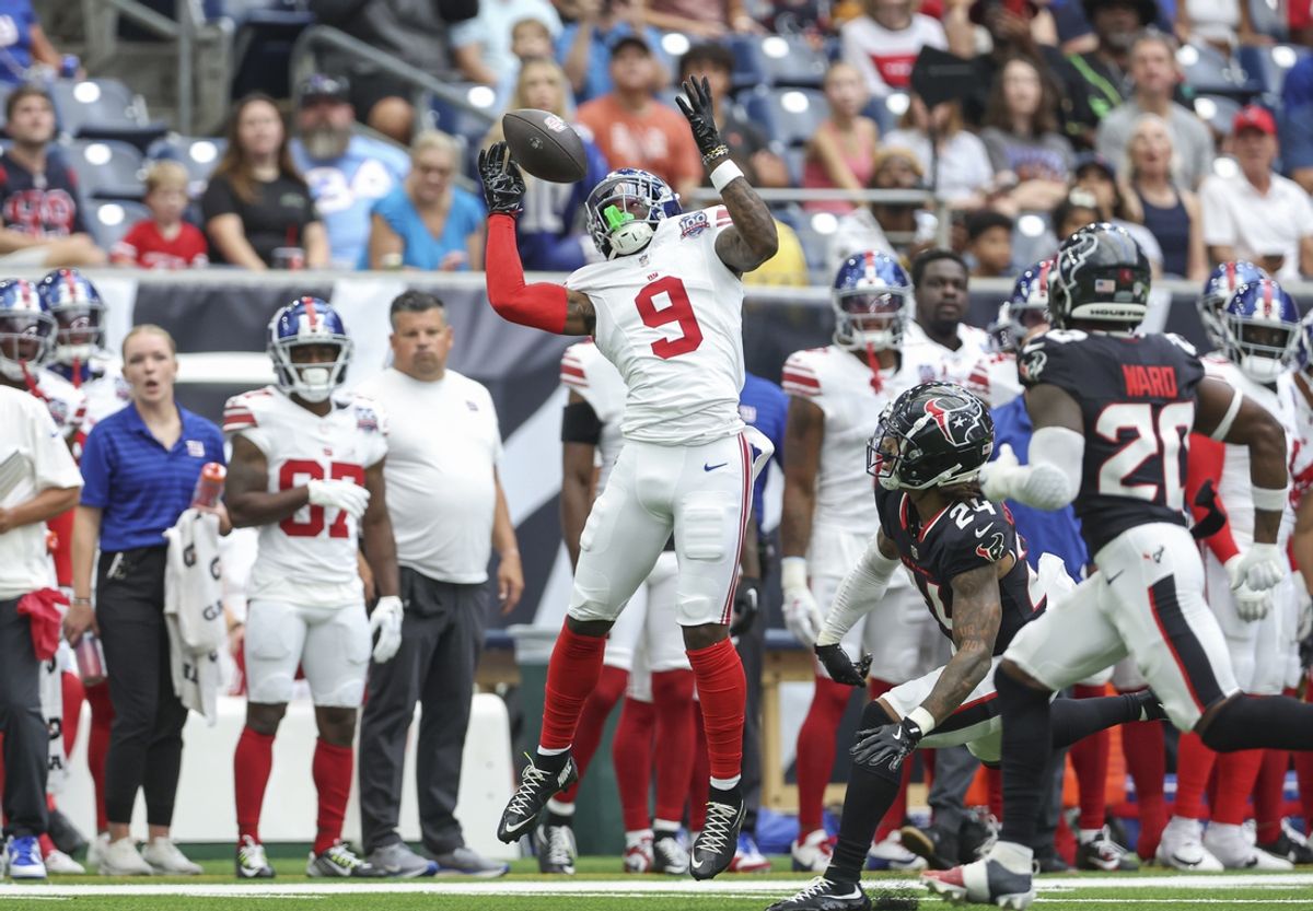 Aug 17, 2024; Houston, Texas, USA; New York Giants wide receiver Malik Nabers (9) attempts to catch a pass during the first quarter against the Houston Texans at NRG Stadium. Mandatory Credit: Troy Taormina-USA TODAY Sports