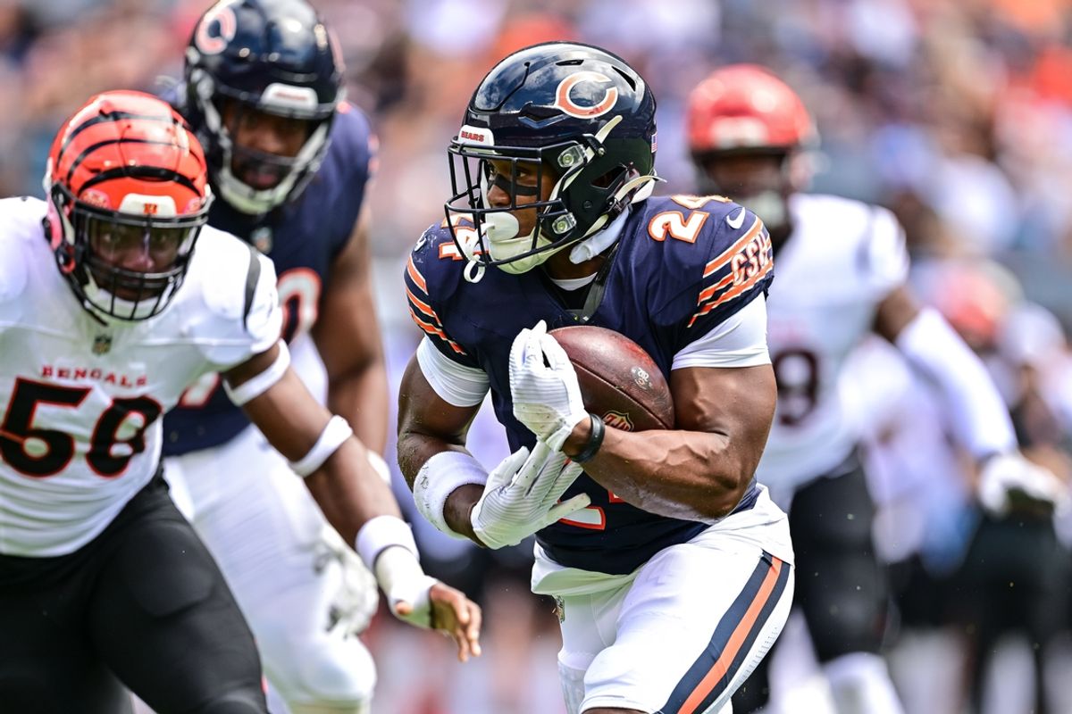 Aug 17, 2024; Chicago, Illinois, USA; Chicago Bears running back Khalil Herbert (24) runs the ball against the Cincinnati Bengals during the first quarter at Soldier Field. Mandatory Credit: Daniel Bartel-Imagn Images