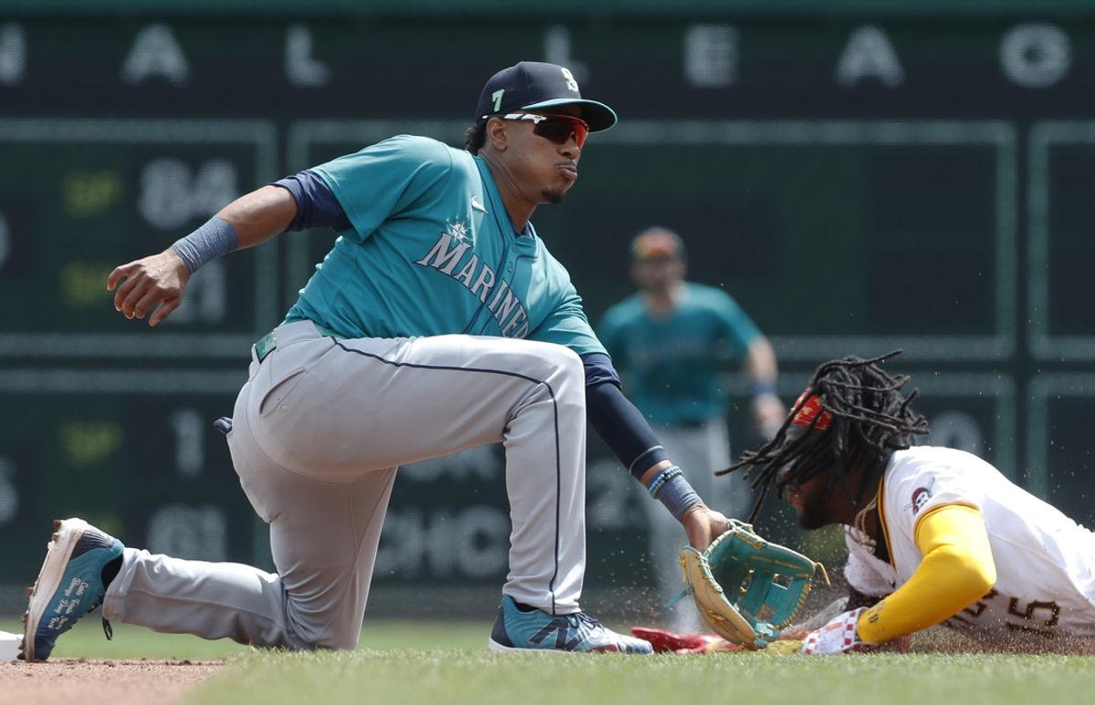 Aug 17, 2024; Pittsburgh, Pennsylvania, USA;  Pittsburgh Pirates designated hitter shortstop Oneil Cruz (15) steals second base as Seattle Mariners shortstop Leo Rivas (76) applies a late tag during the fourth inning at PNC Park. Mandatory Credit: Charles LeClaire-USA TODAY Sports