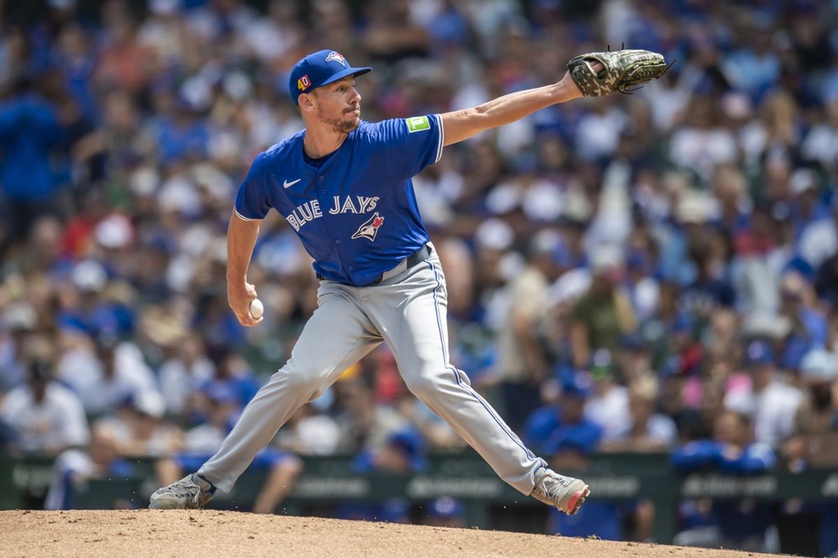 Aug 17, 2024; Chicago, Illinois, USA; Toronto Blue Jays starting pitcher Chris Bassitt (40) pitches during the first inning against the Chicago Cubs at Wrigley Field. Mandatory Credit: Patrick Gorski-USA TODAY Sports