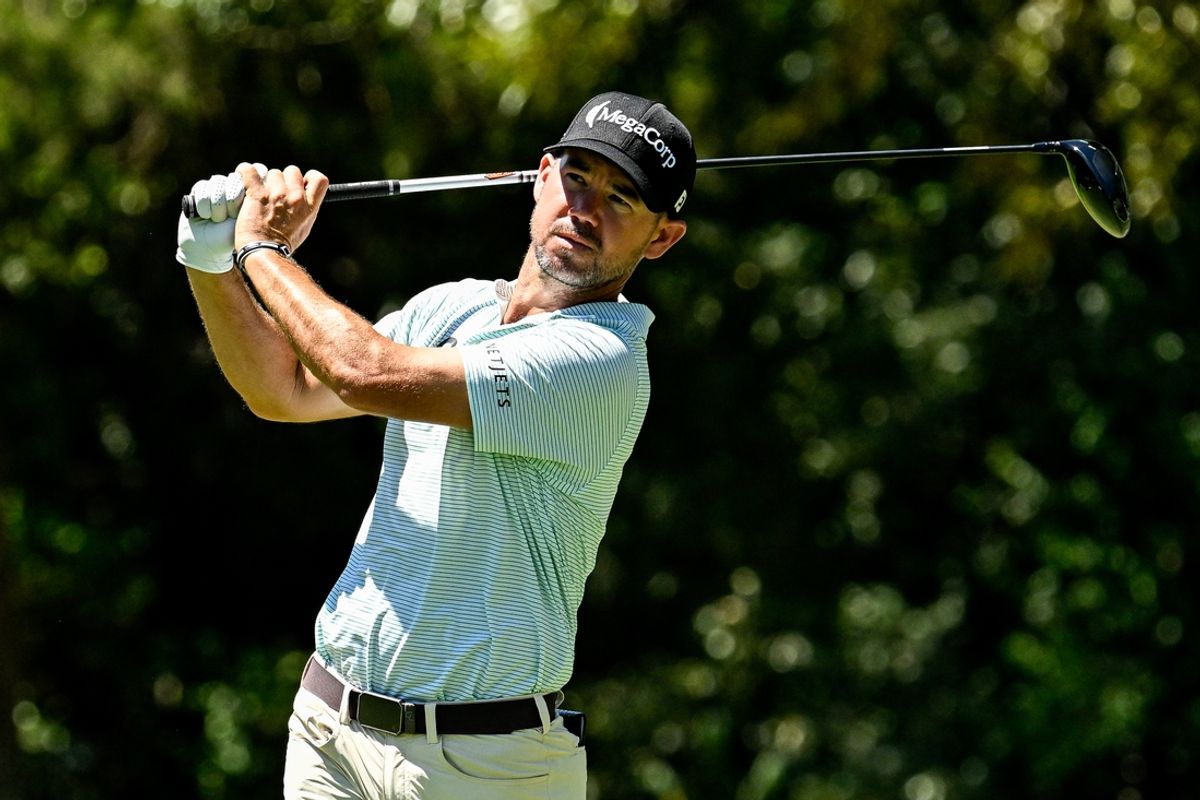 Aug 17, 2024; Memphis, Tennessee, USA; Brian Harman plays his shot from the seventh tee during the third round of the FedEx St. Jude Championship golf tournament at TPC Southwind. Mandatory Credit: Steve Roberts-Imagn Images