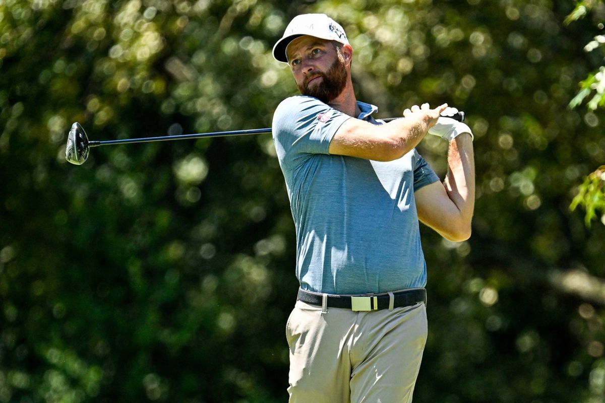 Aug 17, 2024; Memphis, Tennessee, USA; Chris Kirk plays his shot from the seventh tee during the third round of the FedEx St. Jude Championship golf tournament at TPC Southwind. Mandatory Credit: Steve Roberts-Imagn Images