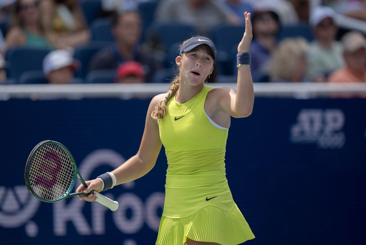 Aug 17, 2024; Cincinnati, OH, USA;  Mirra Andreeva reacts to a point during her match against Iga Swiatek of Poland on day six of the Cincinnati Open. Mandatory Credit: Susan Mullane-Imagn Images