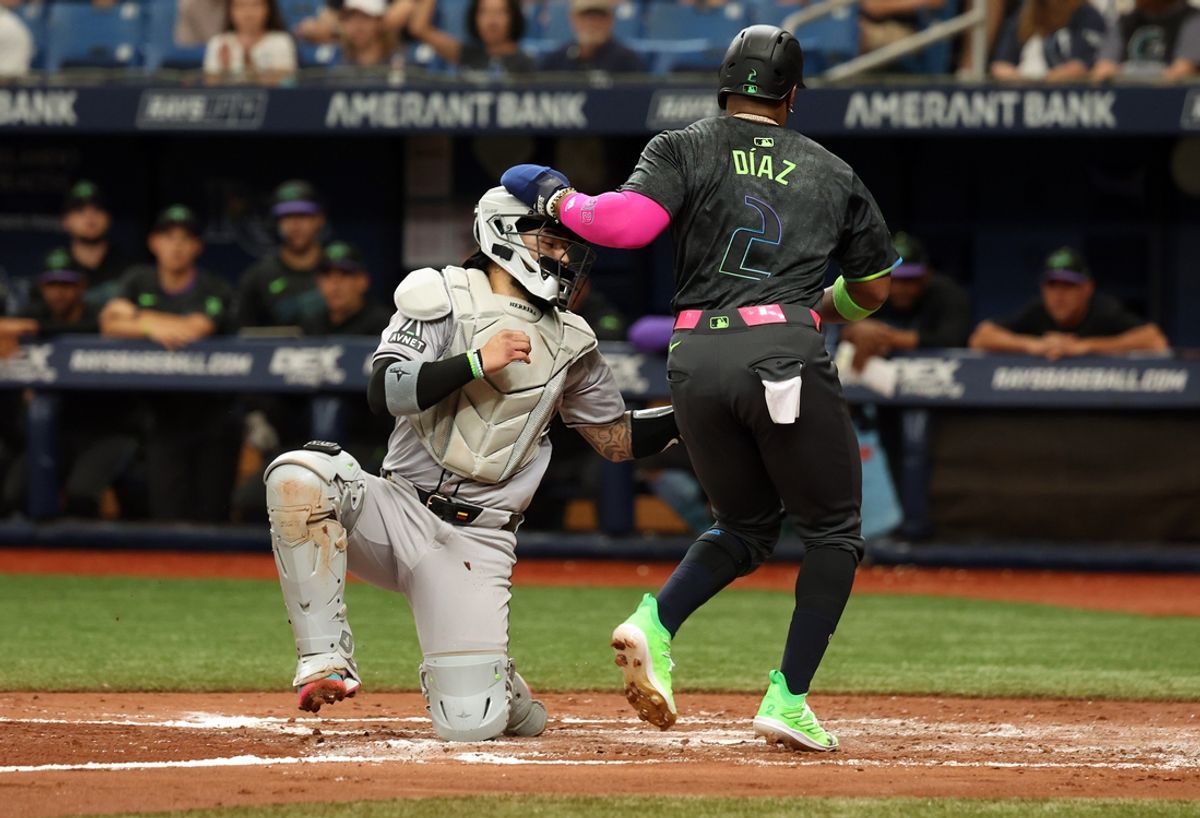 Aug 17, 2024; St. Petersburg, Florida, USA;  Arizona Diamondbacks catcher Jose Herrera (11) tags out Tampa Bay Rays first base Yandy Diaz (2) at home plate during the second inning at Tropicana Field. Mandatory Credit: Kim Klement Neitzel-USA TODAY Sports