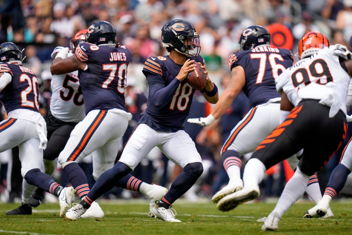 Chicago Bears quarterback Caleb Williams (18) drops back to throw in the first quarter of the NFL Preseason Week 2 game between the Chicago Bears and the Cincinnati Bengals at Soldier Field in downtown Chicago on Saturday, Aug. 17, 2024. The Bears led 10-3 at halftime. (Via OlyDrop)