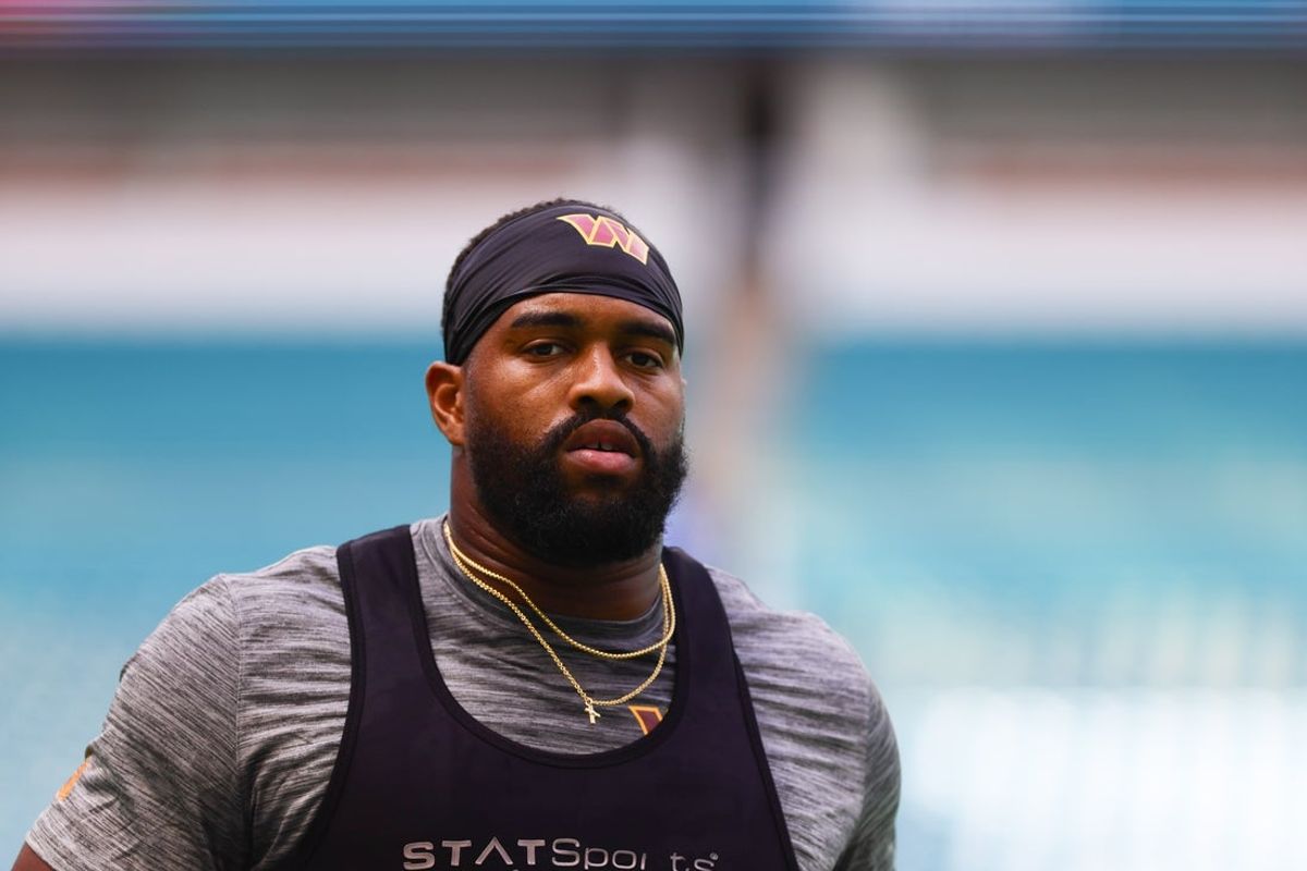 Aug 17, 2024; Miami Gardens, Florida, USA; Washington Commanders defensive tackle Jonathan Allen (93) warms up before a preseason game against the Miami Dolphins at Hard Rock Stadium. Mandatory Credit: Sam Navarro-Imagn Images