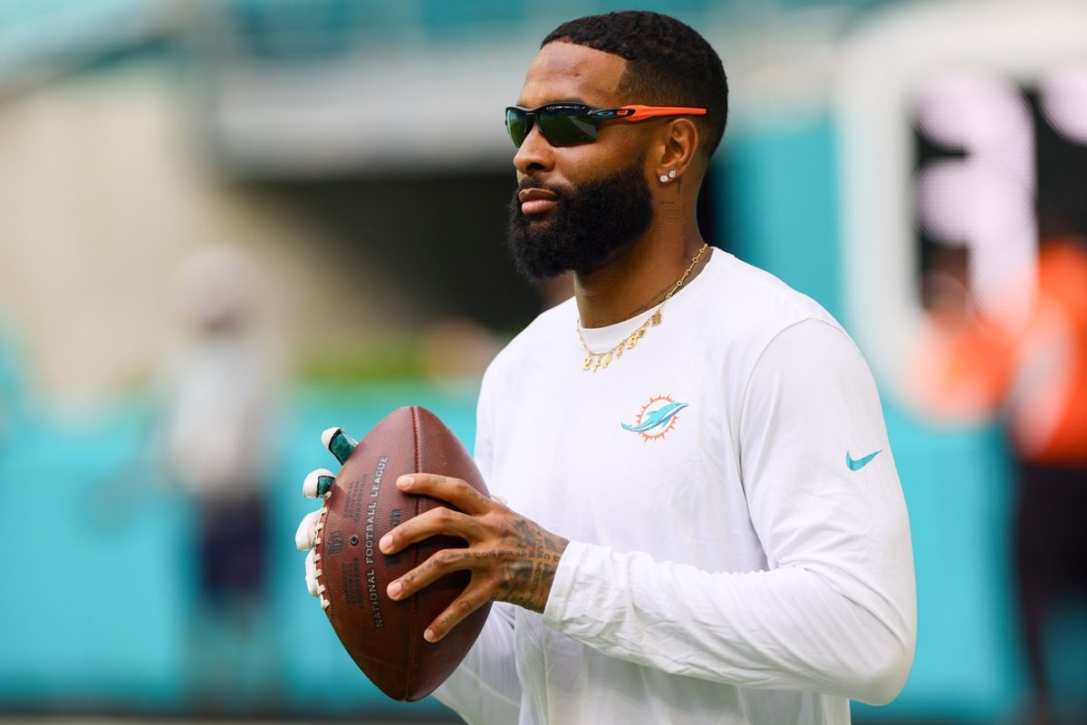Aug 17, 2024; Miami Gardens, Florida, USA; Miami Dolphins wide receiver Odell Beckham Jr. (3) throws the football before preseason game against the Washington Commanders at Hard Rock Stadium. Mandatory Credit: Sam Navarro-Imagn Images