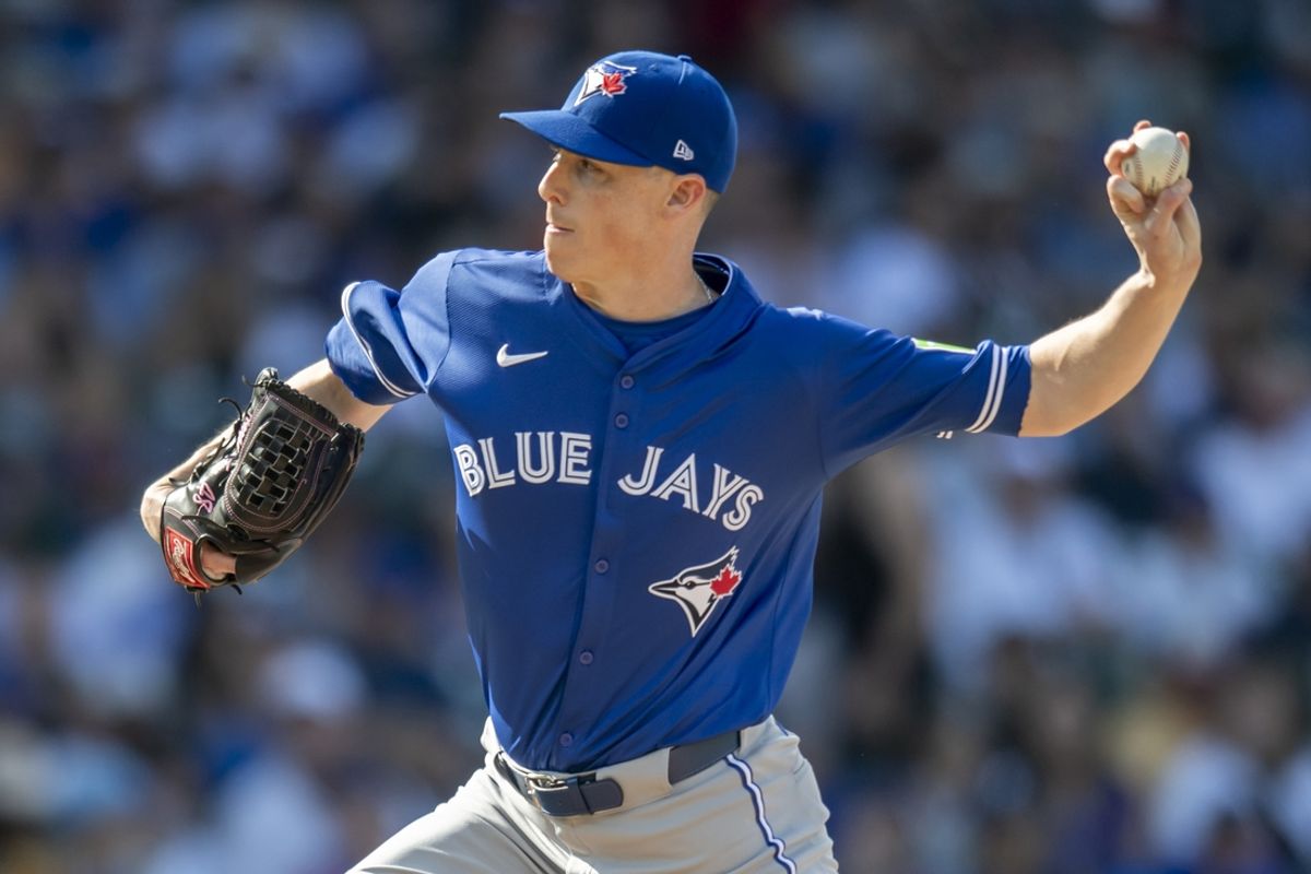 Aug 17, 2024; Chicago, Illinois, USA; Toronto Blue Jays relief pitcher Ryan Yarbrough (35) pitches during the seventh inning against the Toronto Blue Jays at Wrigley Field. Mandatory Credit: Patrick Gorski-Imagn Images