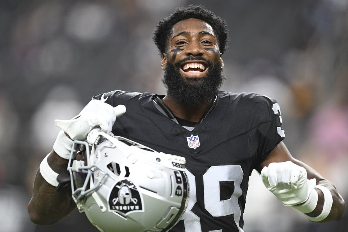 Aug 17, 2024; Paradise, Nevada, USA;  Las Vegas Raiders cornerback Nate Hobbs (39) dances during warmup against the Dallas Cowboys at Allegiant Stadium. Mandatory Credit: Candice Ward-Imagn Images