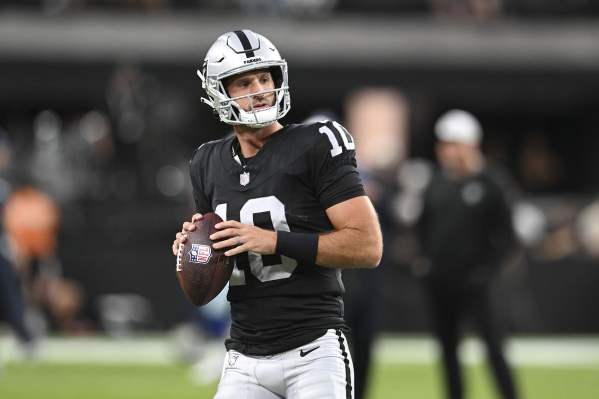Aug 17, 2024; Paradise, Nevada, USA; Las Vegas Raiders quarterback Nathan Peterman (10) warms up against the Dallas Cowboys at Allegiant Stadium. Mandatory Credit: Candice Ward-USA TODAY Sports