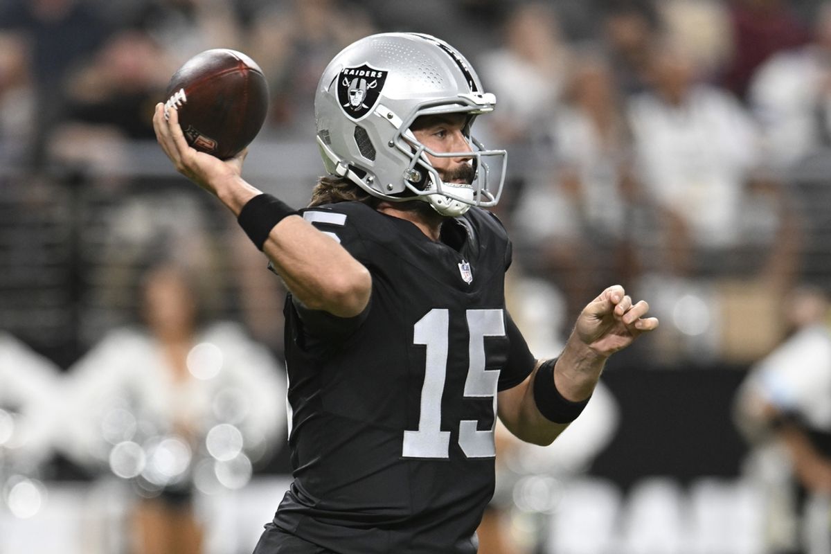 Aug 17, 2024; Paradise, Nevada, USA; Las Vegas Raiders quarterback Gardner Minshew (15) looks to make a pass Dallas Cowboys in the first quarter at Allegiant Stadium. Mandatory Credit: Candice Ward-USA TODAY Sports