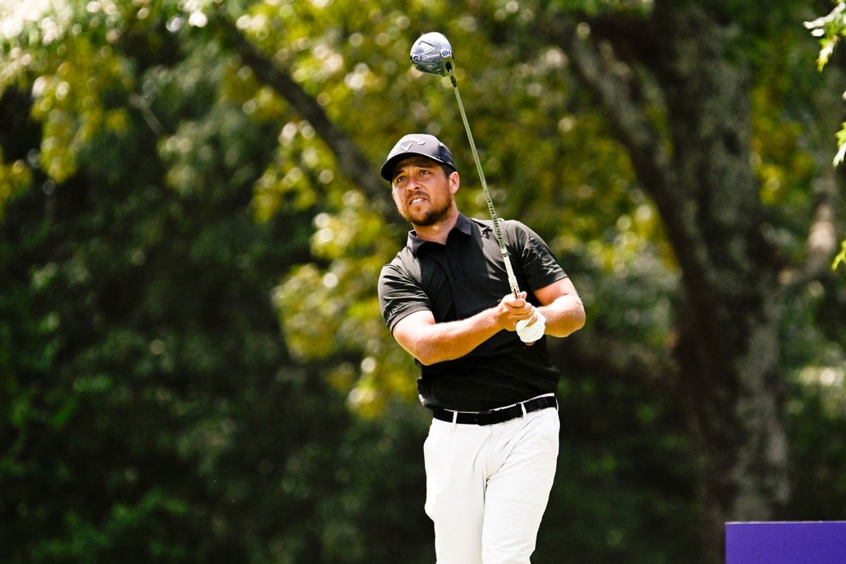 Aug 18, 2024; Memphis, Tennessee, USA; Xander Schauffele plays his shot from the seventh tee during the final round of the FedEx St. Jude Championship golf tournament at TPC Southwind. Mandatory Credit: Steve Roberts-USA TODAY Sports