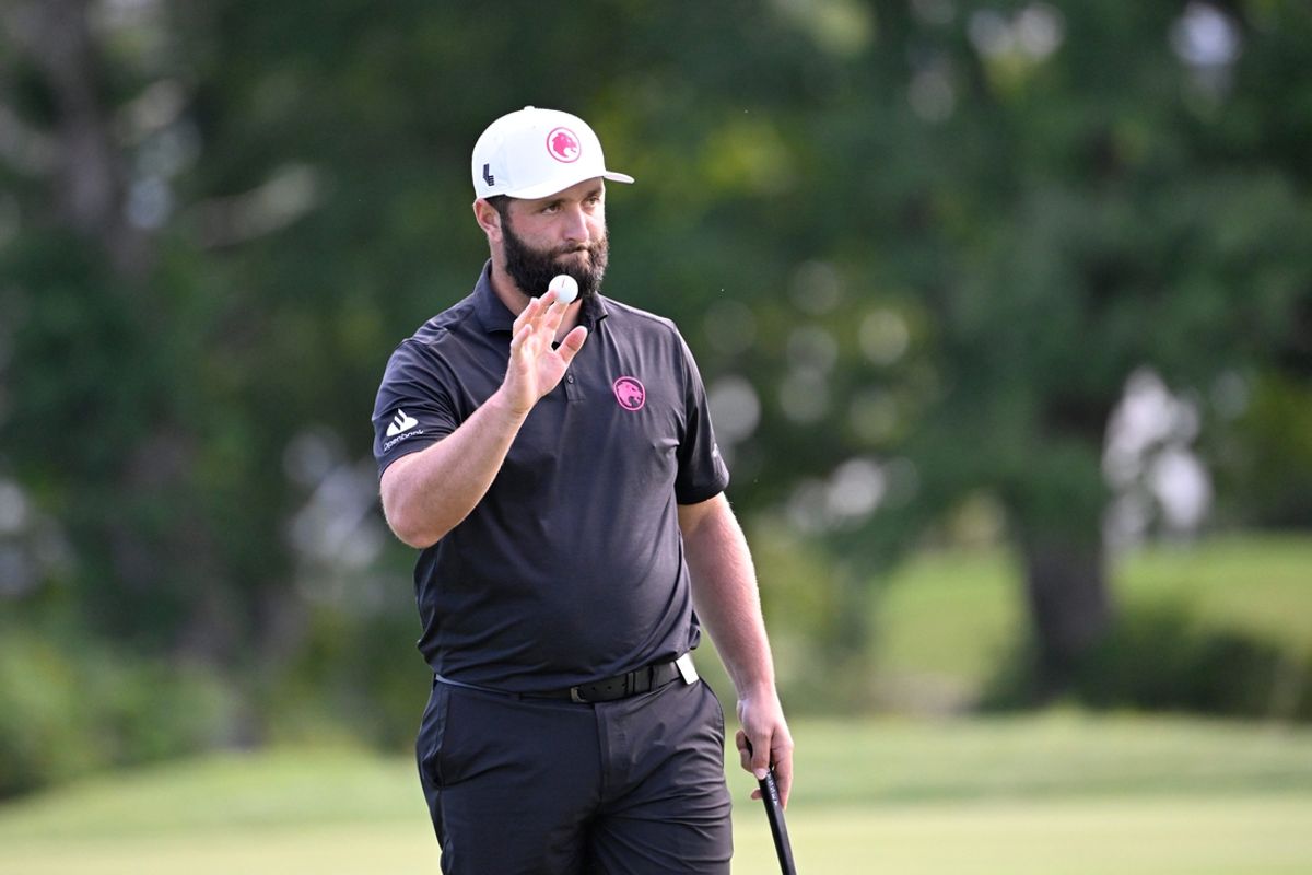 Aug 18, 2024; Greenbrier, West Virginia, USA; Jon Rahm reacts after making a birdie on the 17th hole at The Old White at the Greenbrier. Mandatory Credit: Bob Donnan-Imagn Images