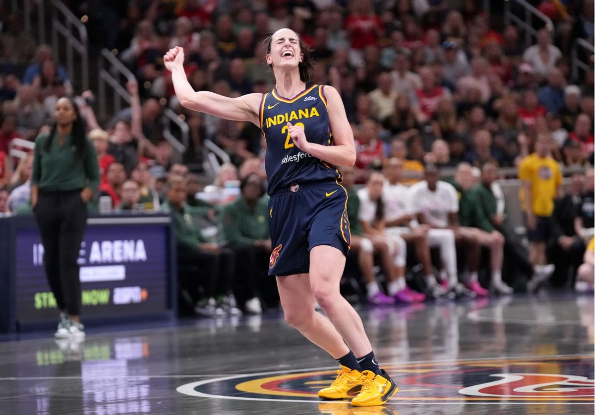 Indiana Fever guard Caitlin Clark (22) reacts as she misses a three-point field goal during the second half of a game against the Seattle Storm on Sunday, Aug. 18, 2024, at Gainbridge Fieldhouse in Indianapolis. The Fever defeated the Storm 92-75.