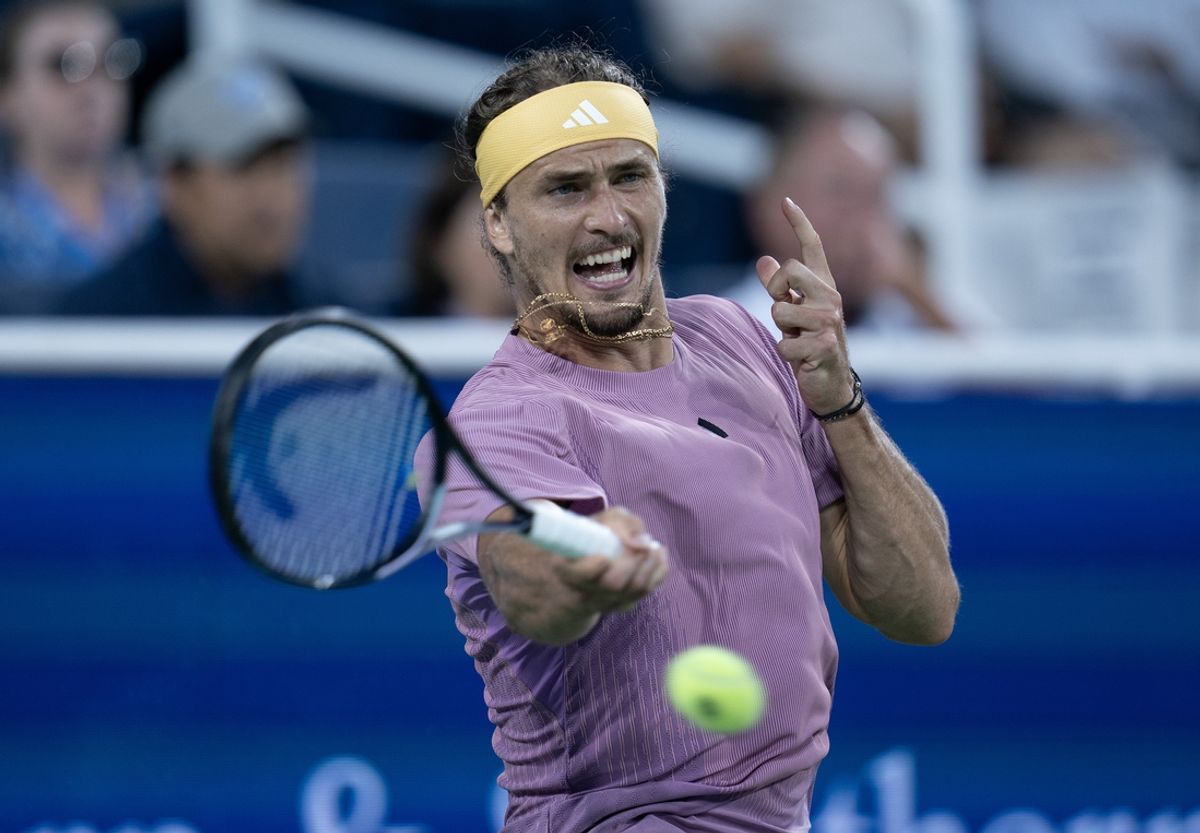 Aug 18 2024; Cincinnati, OH, USA; Alexander Zverev of Germany returns a shot during his match against Jannik Sinner of Italy on day seven of the Cincinnati Open. Mandatory Credit: Susan Mullane-Imagn Images