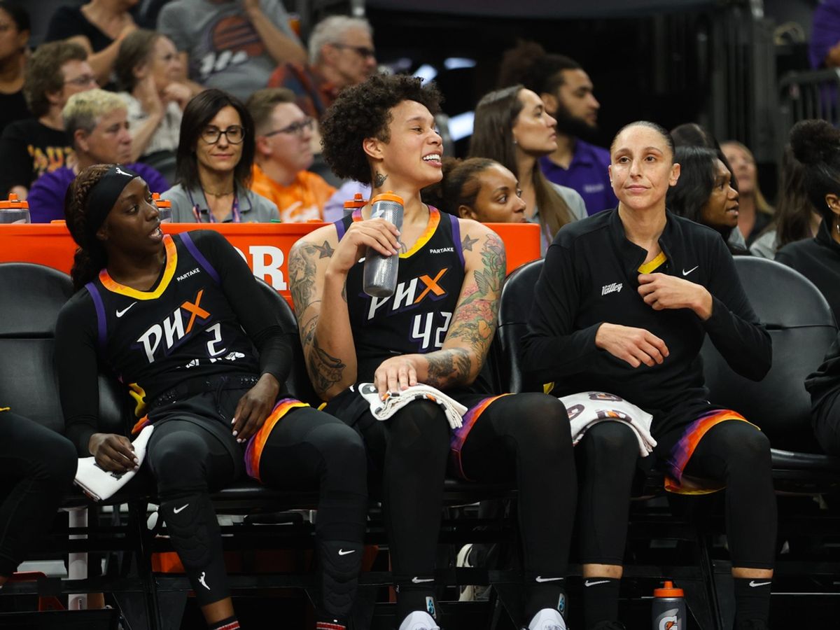 Phoenix Mercury guard Kahleah Copper (2), Phoenix Mercury center Brittney Griner (42) and Phoenix Mercury guard Diana Taurasi (3) sit son the bench during the final minutes of the Mercury win over the Chicago Sky on Aug. 18, 2024 at Footprint Center in Phoenix.