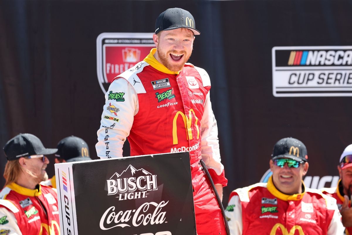 Aug 19, 2024; Brooklyn, Michigan, USA; NASCAR Cup Series driver Tyler Reddick (45) reacts after winning the Fire Keepers 400 at Michigan International Speedway. Mandatory Credit: Mike Dinovo-USA TODAY Sports