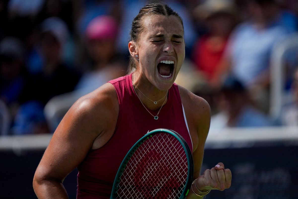 Aryna Sabalenka celebrates a point in the second set of the women’s championship match of the Cincinnati Open at the Lindner Family Tennis Center in Mason, Ohio, on Monday, Aug. 19, 2024. Aryna Sabalenka defeated Jessica Pegula in straight sets, 6-3, 7-5, for the championship.
