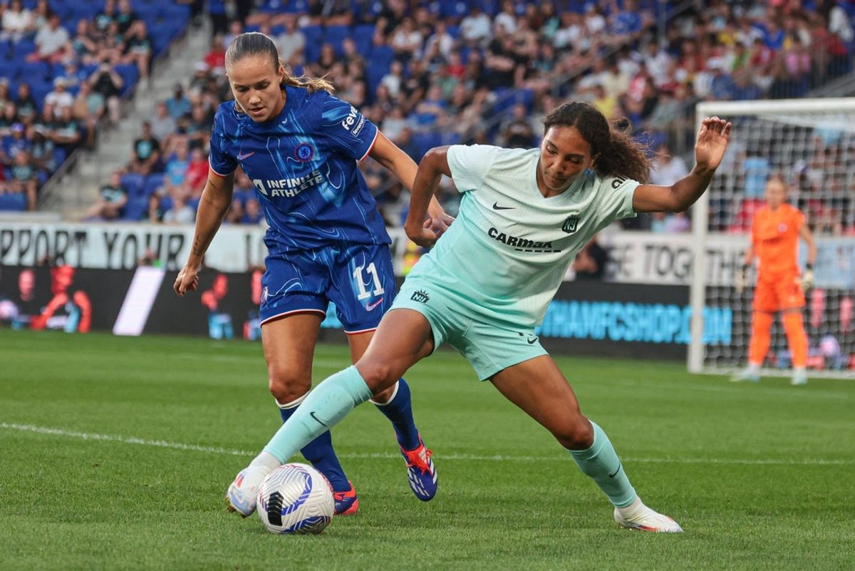 Aug 19, 2024; Harrison, NJ, USA; New Jersey/New York Gotham FC midfielder Yazmeen Ryan (18) plays the ball against Chelsea FC midfielder Guro Reiten (11) during the first half at Red Bull Arena. Mandatory Credit: Vincent Carchietta-Imagn Images