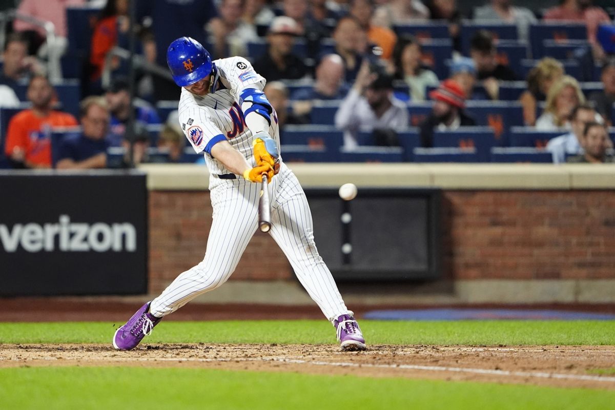 Aug 19, 2024; New York City, New York, USA; New York Mets first baseman Pete Alonso (20) hits a double against the Baltimore Orioles during the fourth inning at Citi Field. Mandatory Credit: Gregory Fisher-USA TODAY Sports
