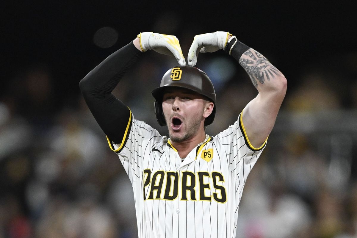 Aug 19, 2024; San Diego, California, USA; San Diego Padres center fielder Jackson Merrill (3) celebrates after hitting an RBI double during the third inning against the Minnesota Twins at Petco Park. Mandatory Credit: Denis Poroy-USA TODAY Sports