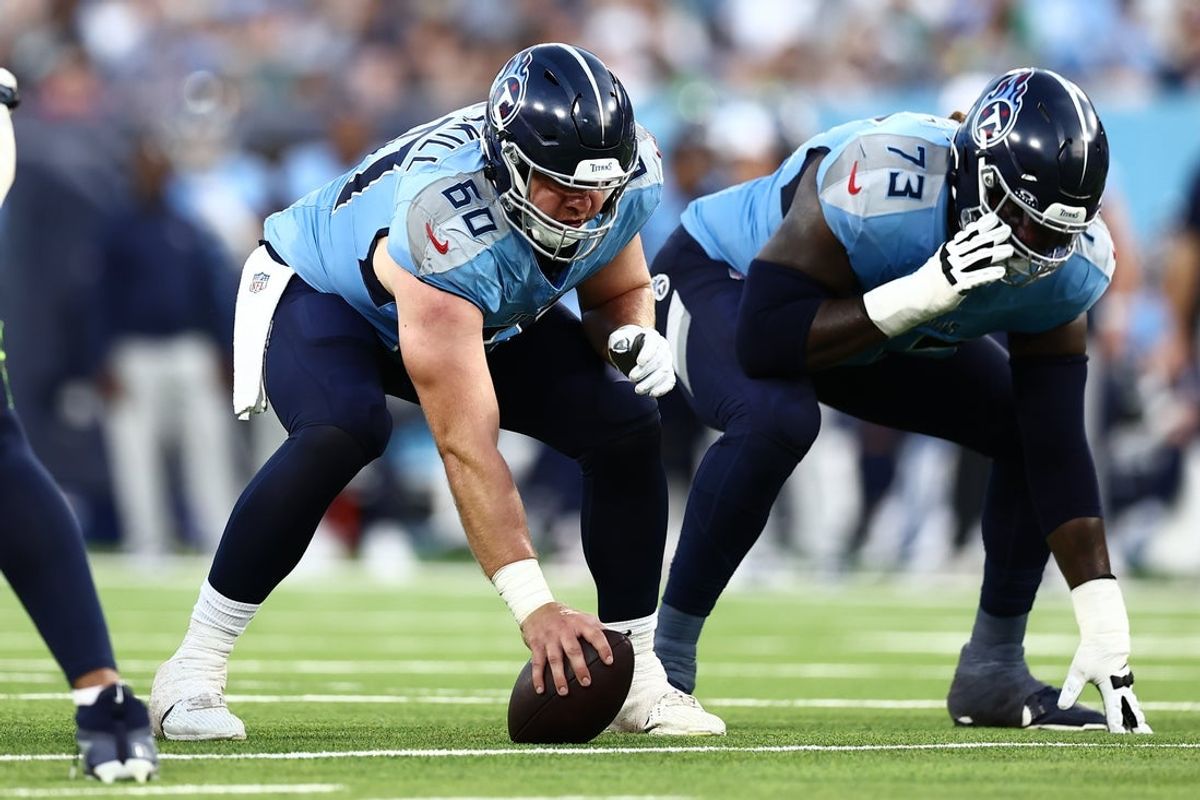 Aug 17, 2024; Nashville, Tennessee, USA; Tennessee Titans offensive tackle Daniel Brunskill (60) and offensive tackle Lachavious Simmons (73) set up for a play in the second quarter against the Seattle Seahawks at Nissan Stadium. Mandatory Credit: Casey Gower-Imagn Images