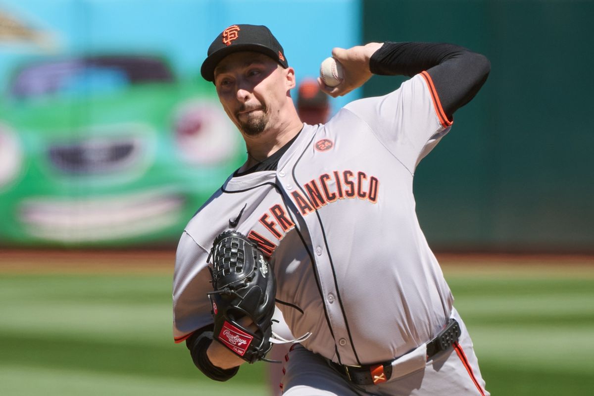 Aug 18, 2024; Oakland, California, USA; San Francisco Giants starting pitcher Blake Snell (7) throws a pitch against the Oakland Athletics during the first inning at Oakland-Alameda County Coliseum. Mandatory Credit: Robert Edwards-USA TODAY Sports