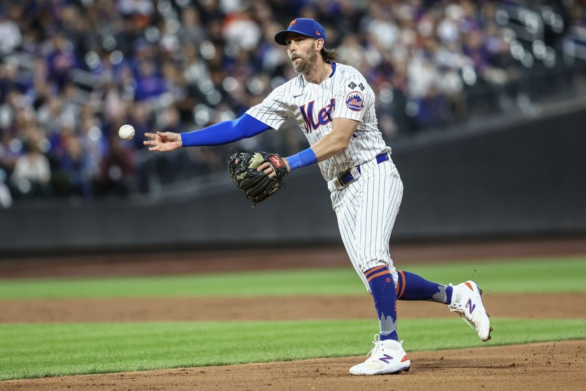 Aug 20, 2024; New York City, New York, USA;  New York Mets second baseman Jeff McNeil (1) makes a running throw to first base against the Baltimore Orioles in the third inning at Citi Field. Mandatory Credit: Wendell Cruz-Imagn Images