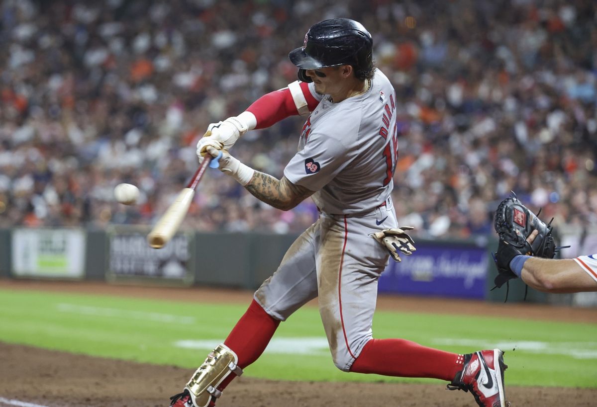 Aug 20, 2024; Houston, Texas, USA; Boston Red Sox center fielder Jarren Duran (16) hits an RBI double during the fourth inning against the Houston Astros at Minute Maid Park. Mandatory Credit: Troy Taormina-USA TODAY Sports
