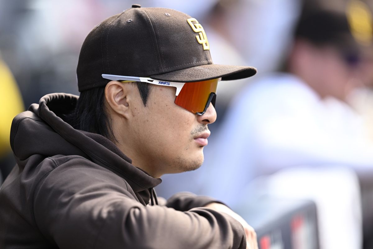 Aug 21, 2024; San Diego, California, USA; San Diego Padres shortstop Ha-Seong Kim (7) looks on during the first inning against the Minnesota Twins at Petco Park. Mandatory Credit: Orlando Ramirez-Imagn Images