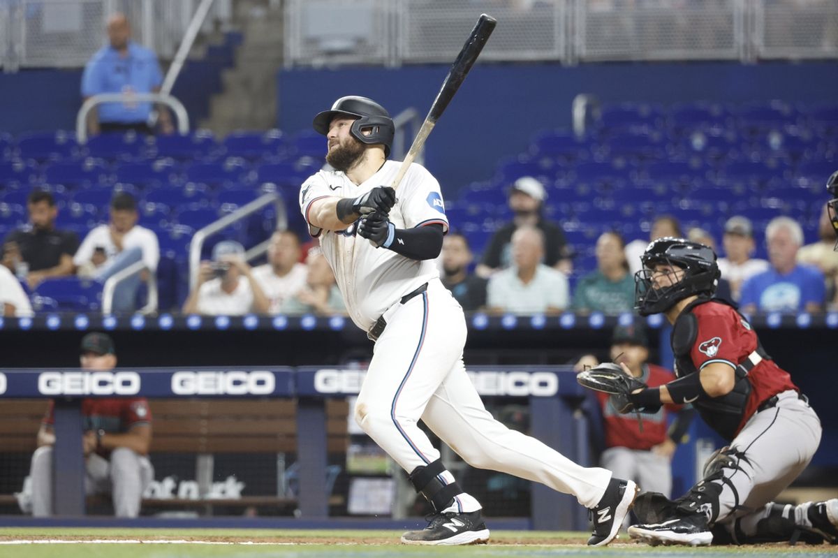 Aug 21, 2024; Miami, Florida, USA;  Miami Marlins third baseman Jake Burger (36) hits a two-run home run against the Arizona Diamondbacks in the first inning at loanDepot Park. Mandatory Credit: Rhona Wise-USA TODAY Sports