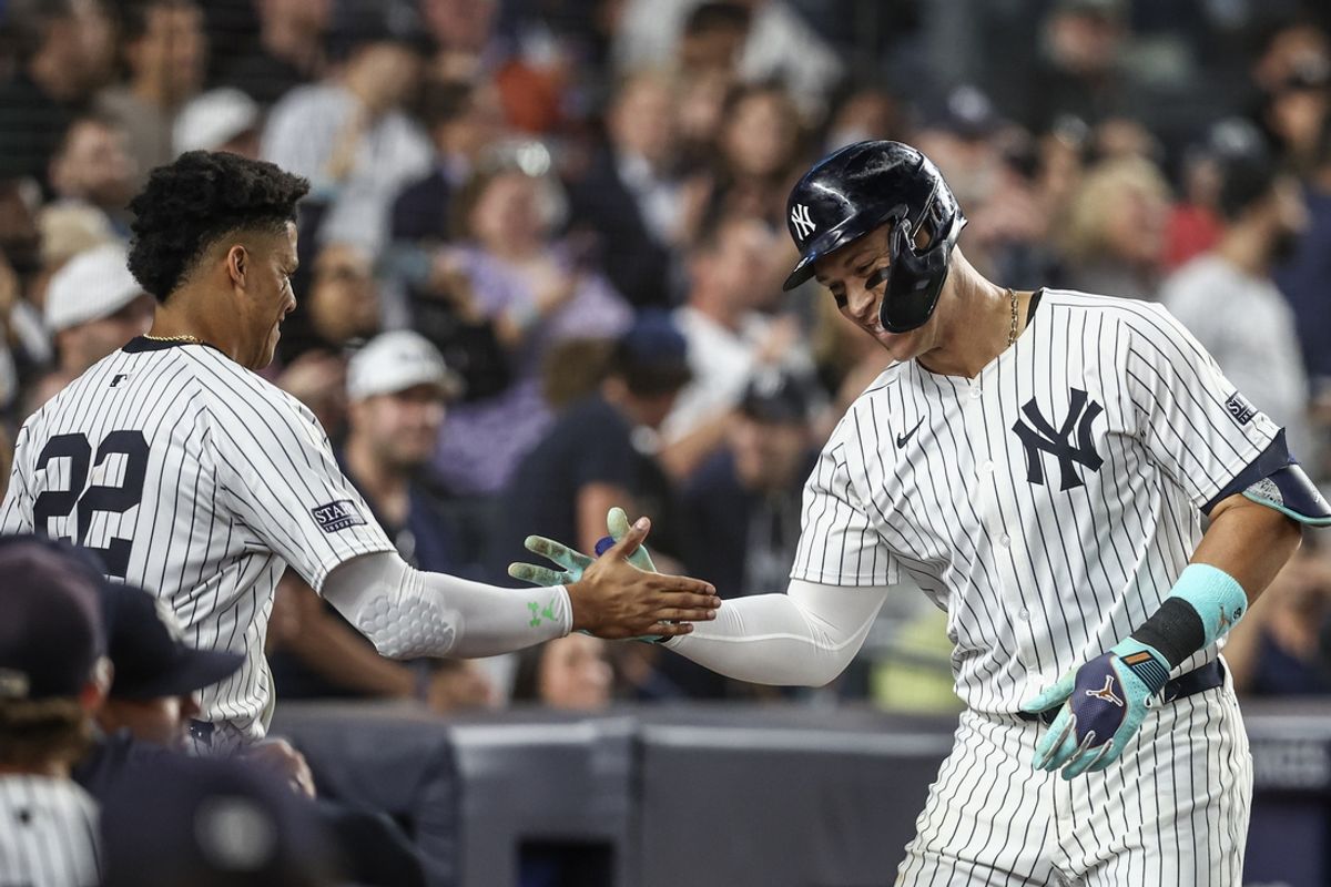 Aug 21, 2024; Bronx, New York, USA;  New York Yankees center fielder Aaron Judge (99) celebrates with right fielder Juan Soto (22) after hitting a solo home run in the seventh inning against the Cleveland Guardians at Yankee Stadium. Mandatory Credit: Wendell Cruz-USA TODAY Sports