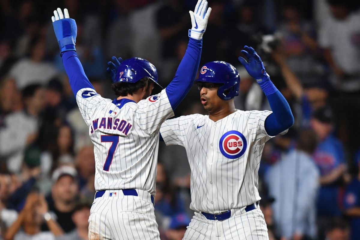 Aug 21, 2024; Chicago, Illinois, USA; Chicago Cubs catcher Christian Bethancourt (right) celebrates his two-run home run with shortstop Dansby Swanson (left) during the fifth inning against the Detroit Tigers at Wrigley Field. Mandatory Credit: Patrick Gorski-USA TODAY Sports