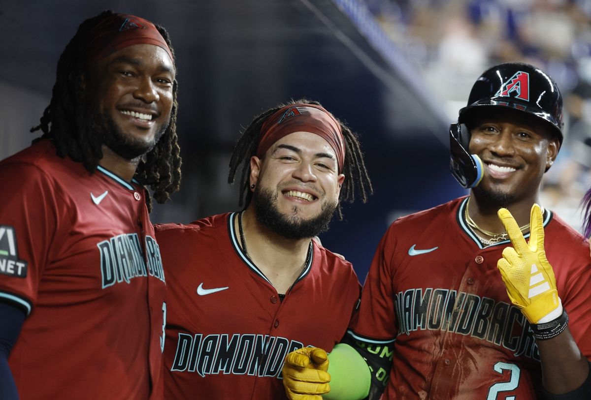 Aug 21, 2024; Miami, Florida, USA;  Arizona Diamondbacks first baseman Josh Bell (36), catcher Jose Herrera (11) and shortstop Geraldo Perdomo (2) pose for a picture after Perdomo after hit a home run against the Miami Marlins in the eighth inning at loanDepot Park. Mandatory Credit: Rhona Wise-USA TODAY Sports