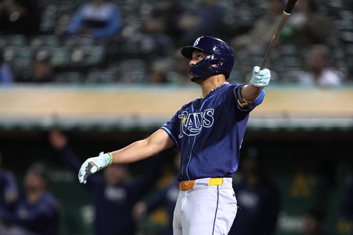 Aug 21, 2024; Oakland, California, USA; Tampa Bay Rays center fielder Jose Siri (22) watches the flight of his home run against the Oakland Athletics during the seventh inning at Oakland-Alameda County Coliseum. Mandatory Credit: Darren Yamashita-USA TODAY Sports