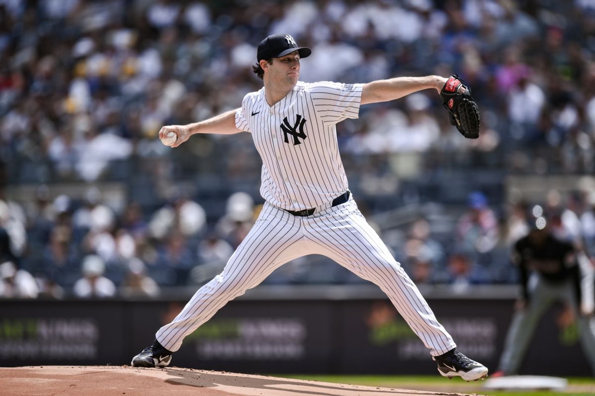 Aug 22, 2024; Bronx, New York, USA; New York Yankees pitcher Gerrit Cole (45) pitches against the Cleveland Guardians during the first inning at Yankee Stadium. Mandatory Credit: John Jones-USA TODAY Sports